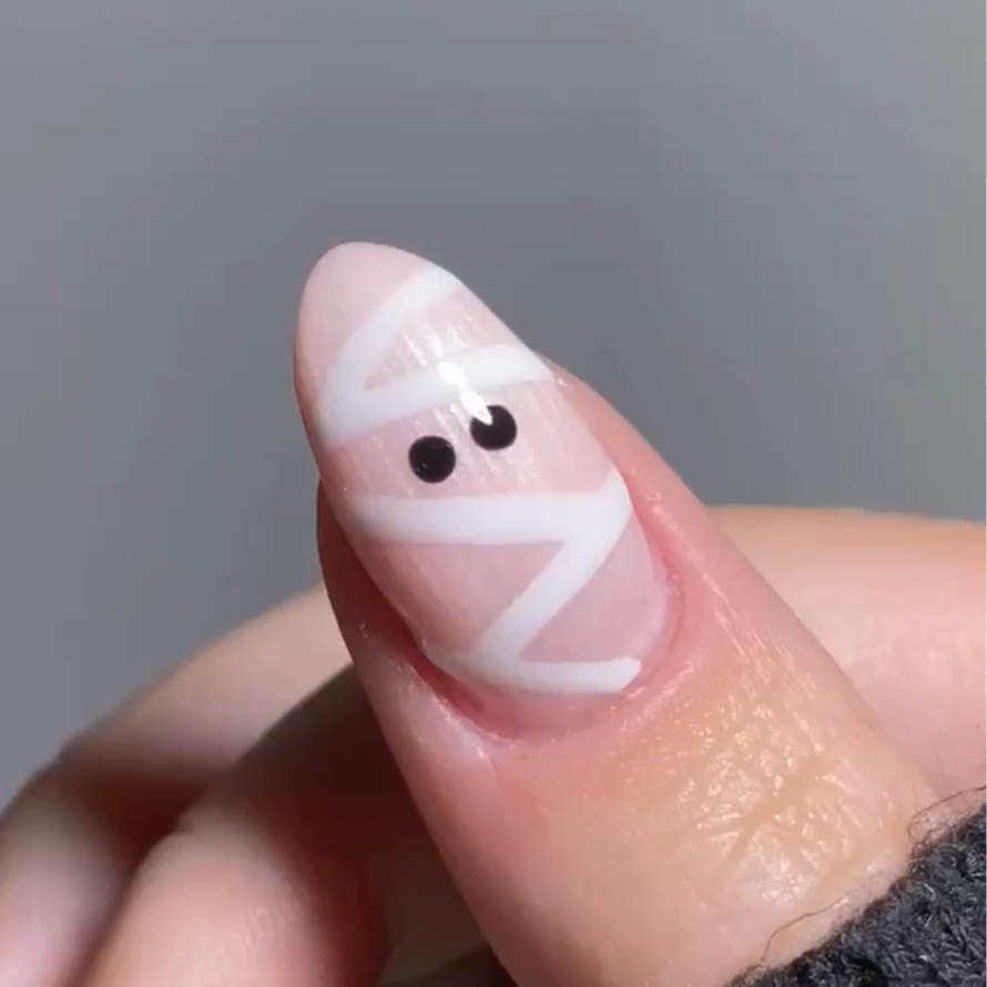 How to create Mummy Halloween Nail Art?