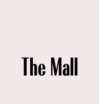 The image shows the text "The Mall" in black letters on a light pink background.