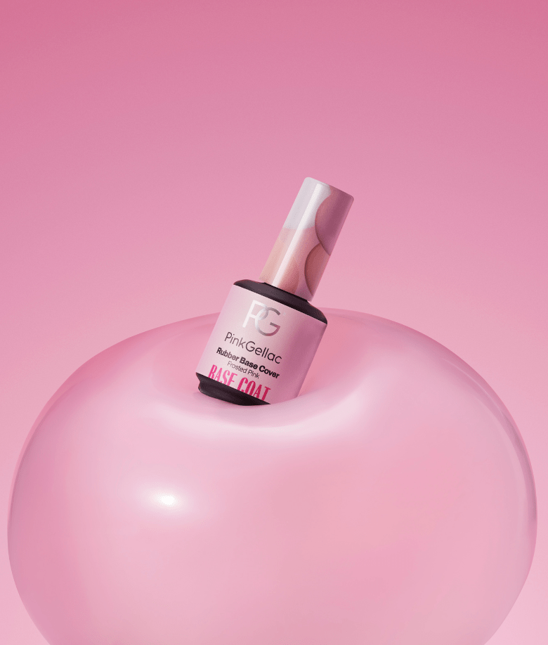 Nail polish bottle from Pink Gellac with rubber base in pink tint on a pink background.