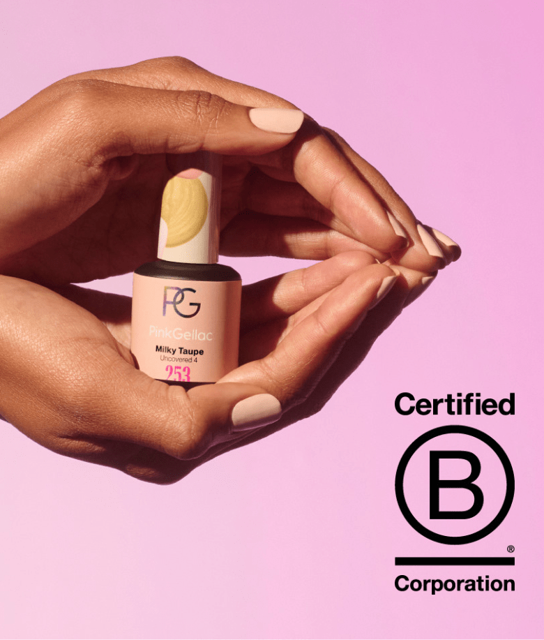 Two hands hold a bottle of Pink Gellac nail polish with the text "Milky Taupe" on a pink background, with the Certified B Corporation logo next to it.