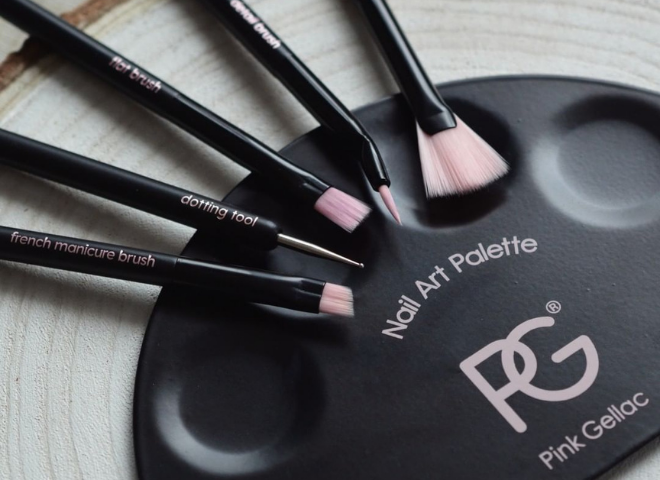 Black and pink nail art brushes and tools on a black Nail Art Palette from Pink Gellac.