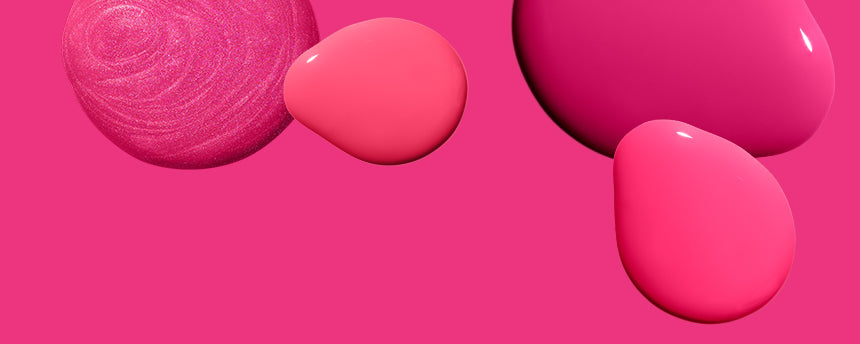 Pink background with drops and shapes in different shades of pink and textures.