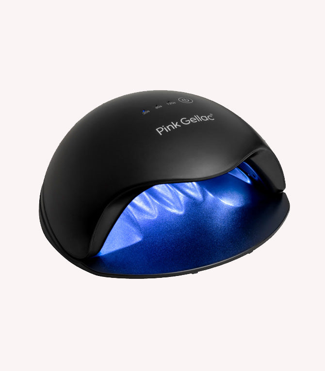 A black nail dryer with blue LED lights and the text "Pink Gellac" on it.