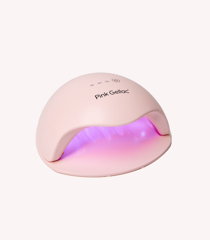 Pink LED lamp for nail polish drying, brand name "Pink Gellac" visible on top.