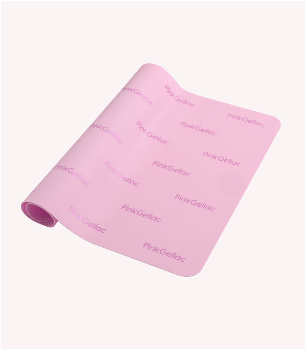 Pink silicone mat with repeated "Pink Gellac" logo on a light background.