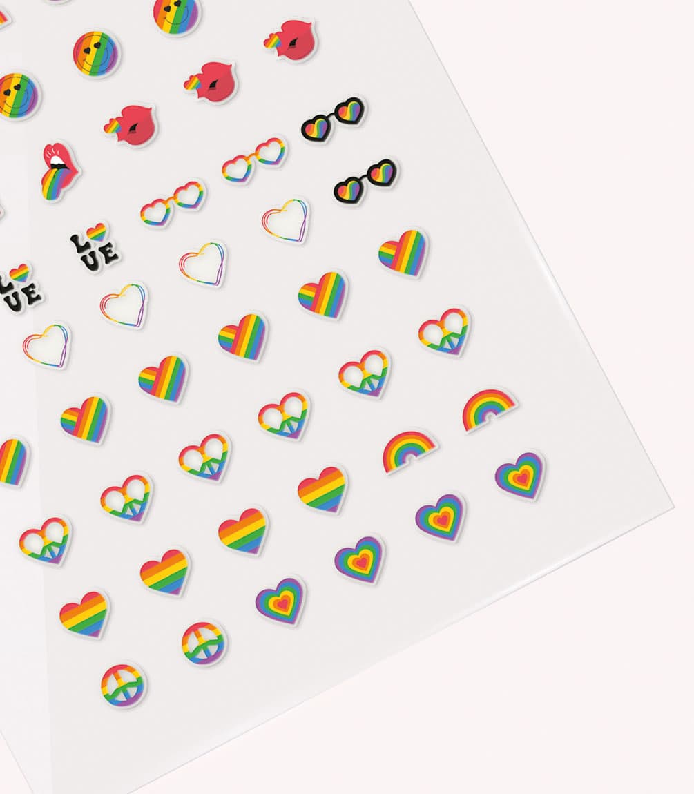 A set of stickers with rainbow motifs, including hearts, glasses, lips and peace signs.