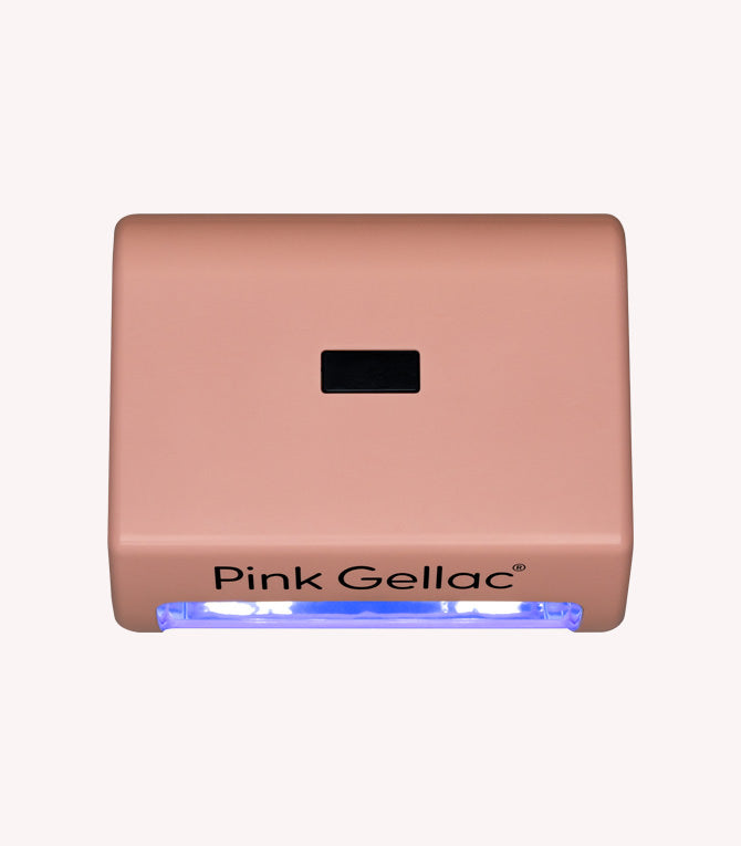Pink LED nail lamp with blue glow, brand name "Pink Gellac" on the front.