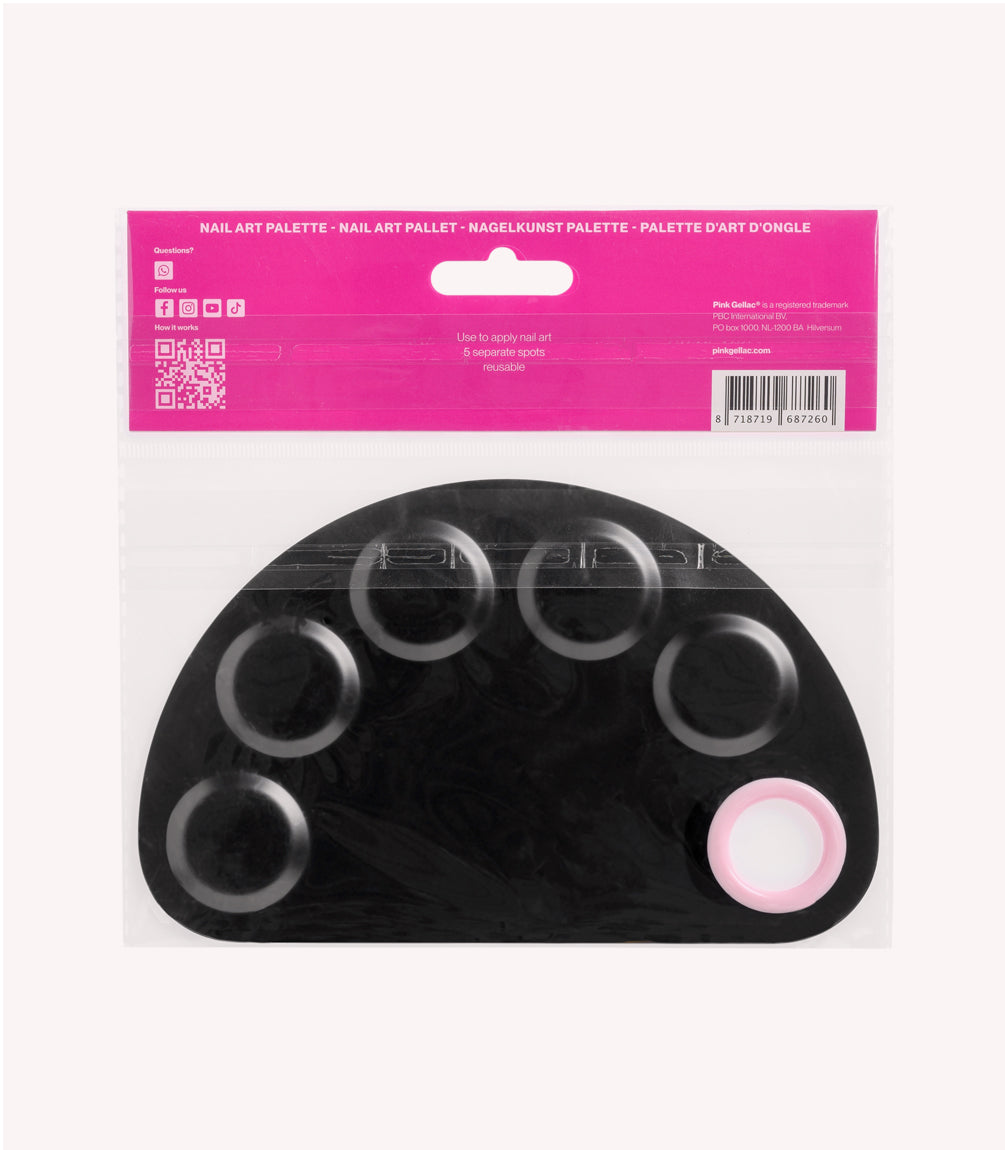 Black nail art palette in a pink and transparent packaging with five round cutouts.