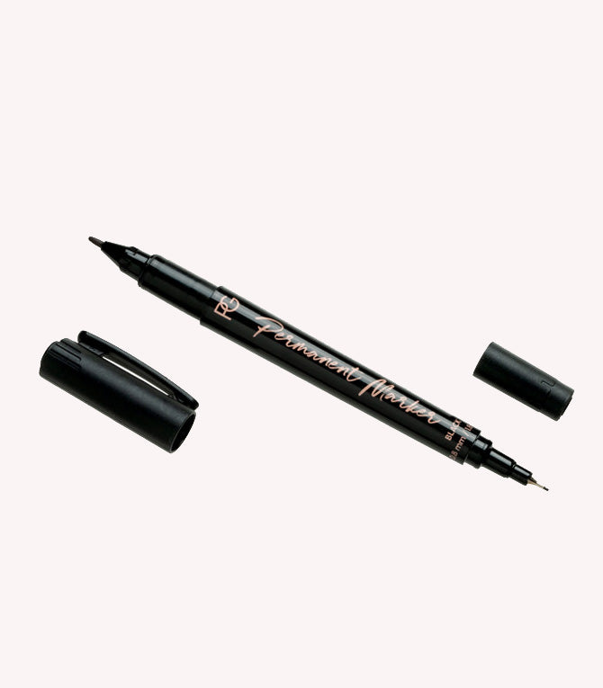 Black permanent marker with removable caps at both ends.