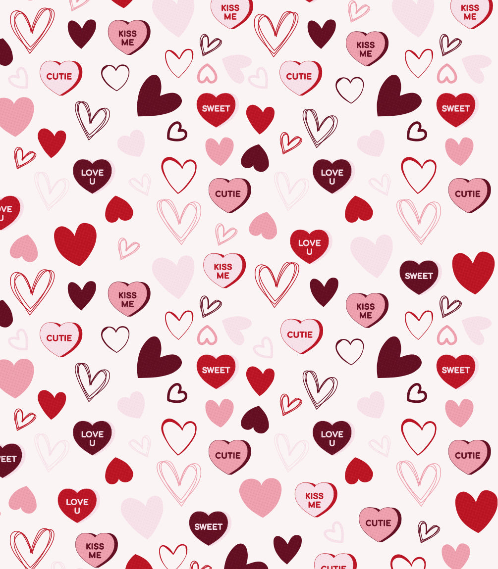 A pattern of different drawn and colored hearts with words like "Kiss Me," "Cutie," "Love U," and "Sweet" in red, pink, and white on a light background.