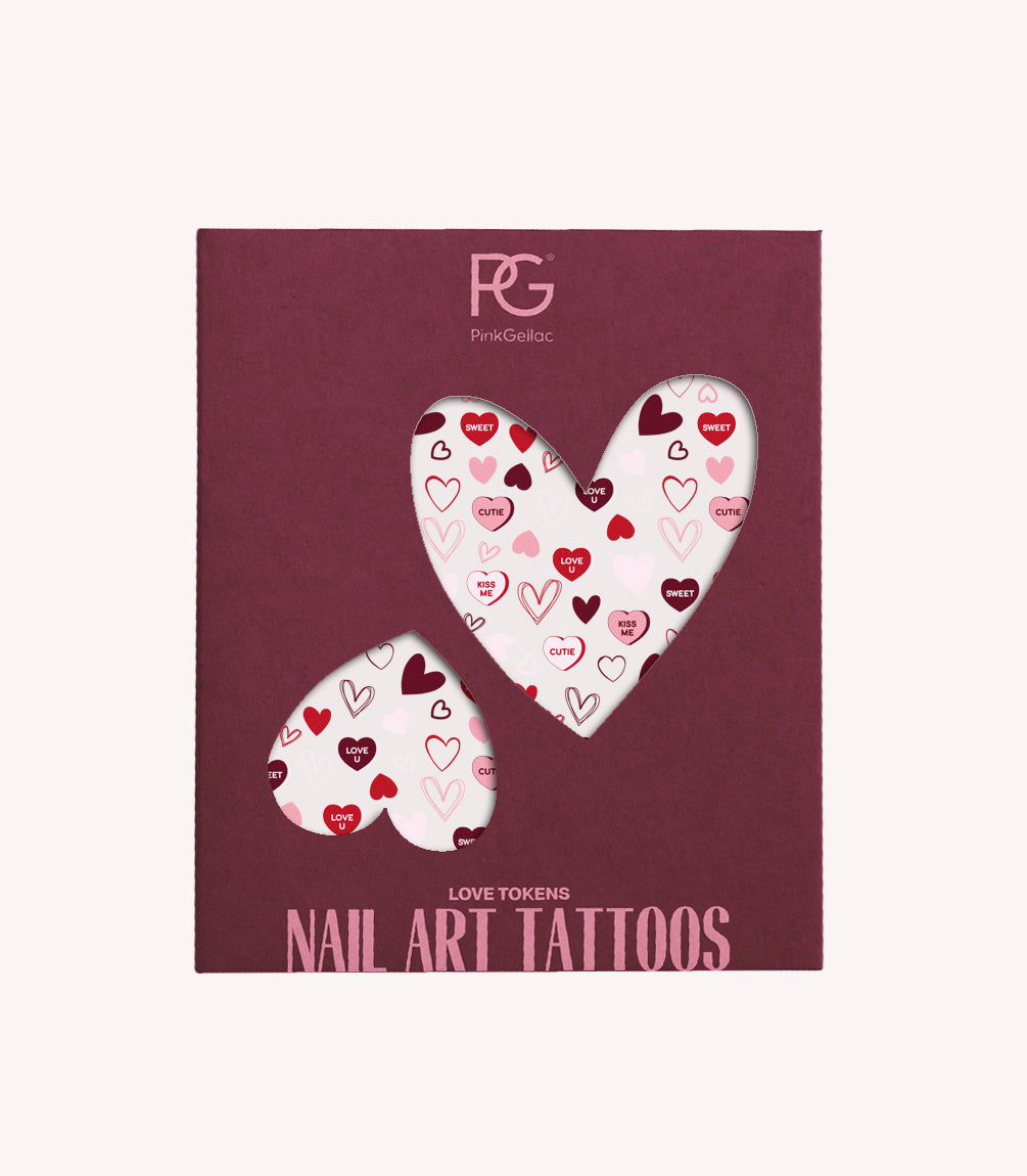 Packaging of Pink Gellac "Love Tokens" nail art tattoos with heart patterns and texts such as "Kiss Me" and "Love U", in pink and red tones on a dark pink background.