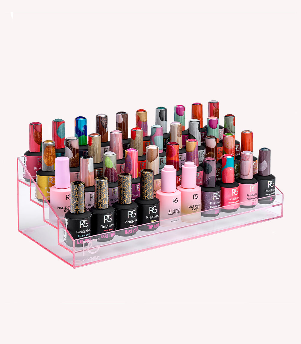 A transparent rack full of colorful bottles of nail polish in different shades and designs.