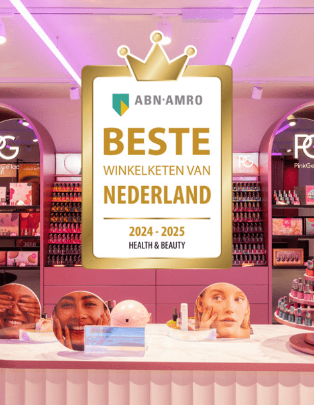 Interior of a cosmetics and beauty store with a large sign with the text "ABN AMRO Best Retail Chain in the Netherlands 2024-2025 Health & Beauty" and colorful products on display.