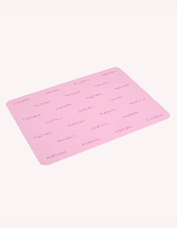 Pink placemat with the "Pink Gellac" brand repeatedly printed on it, against a white background.