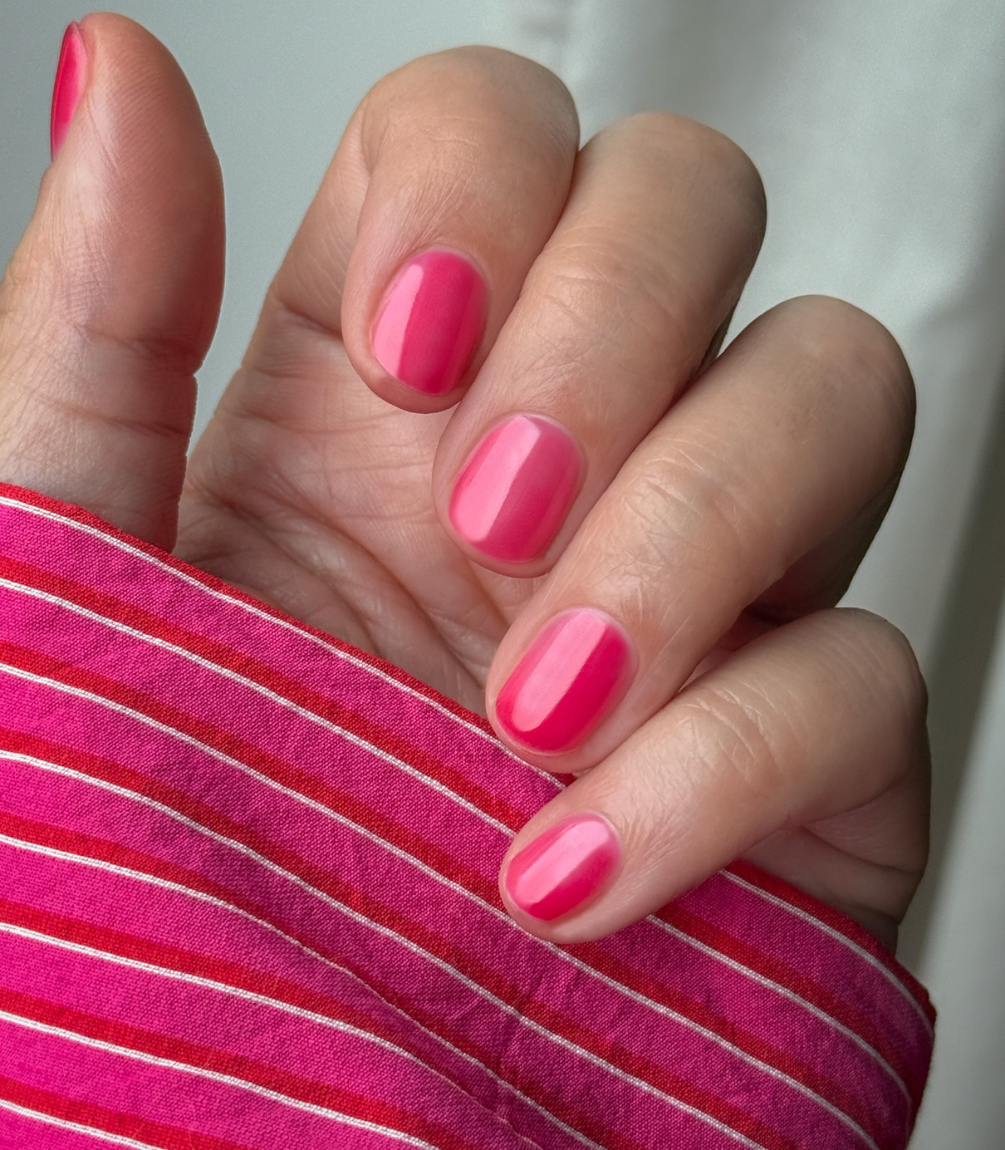 Close-up of Pink Gellac Jelly Coat Ballet Tint gel polish texture.