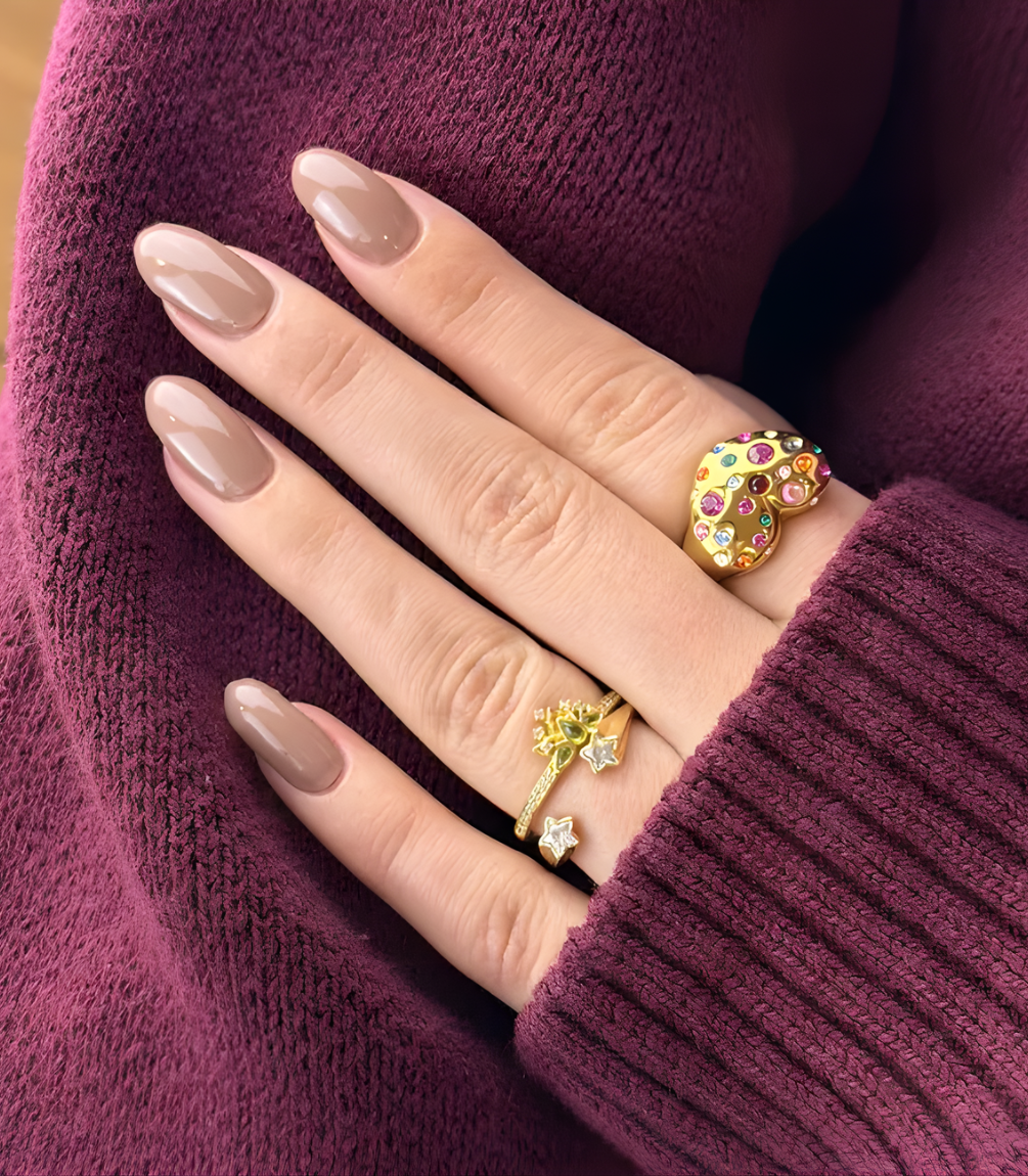 Hand wearing Pink Gellac 033 Earthy Brown gel nail stickers.