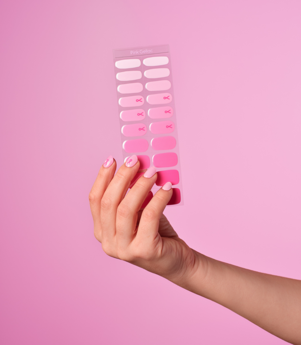 Hand wearing Pink Gellac 052 Blushed Ribbon gel nail stickers.