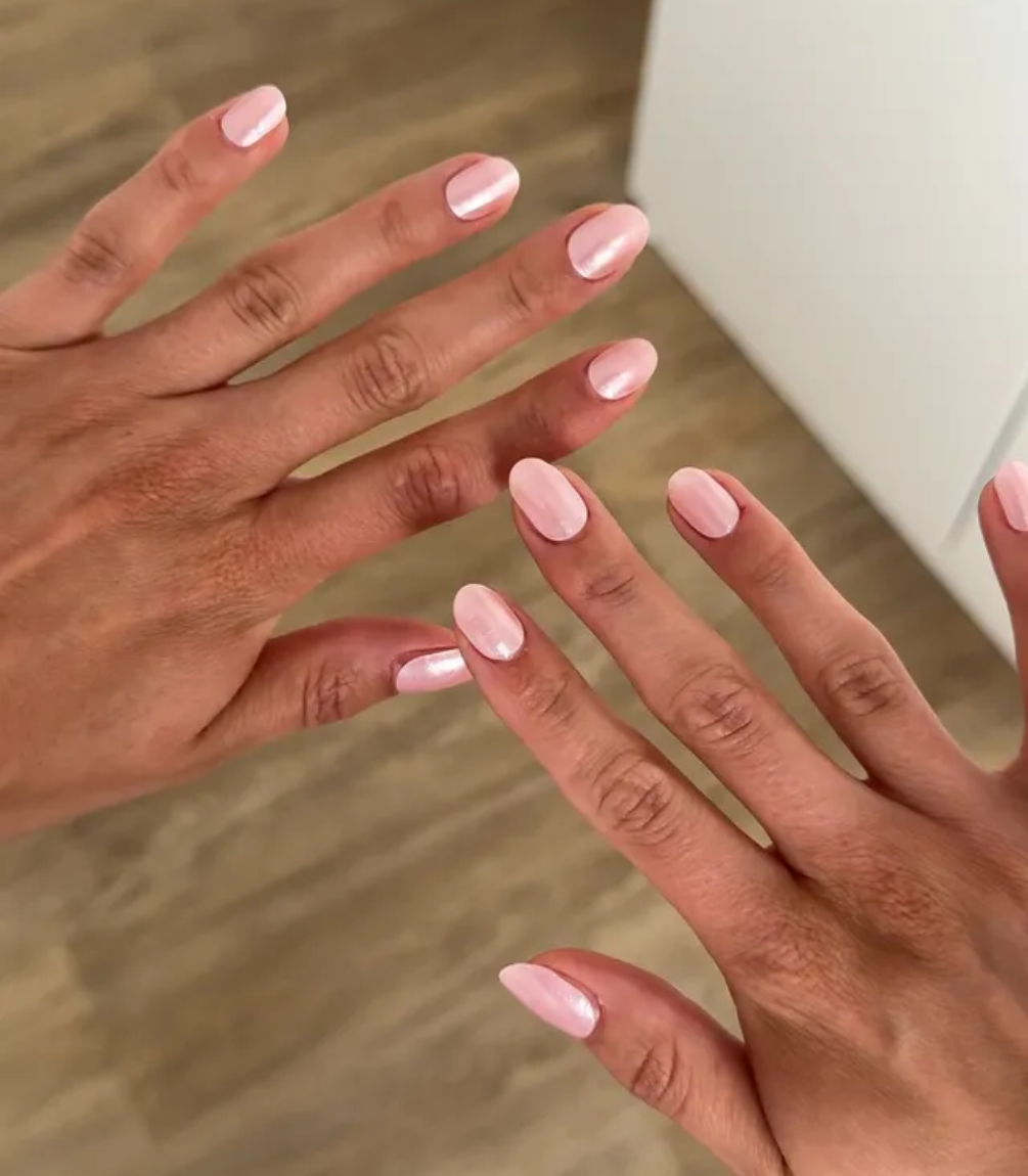 Hand wearing Pink Gellac 021 Pearly Pink gel nail stickers.