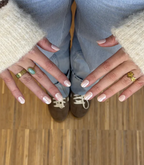 Hand wearing Pink Gellac 013 Electric Chrome gel nail stickers.
