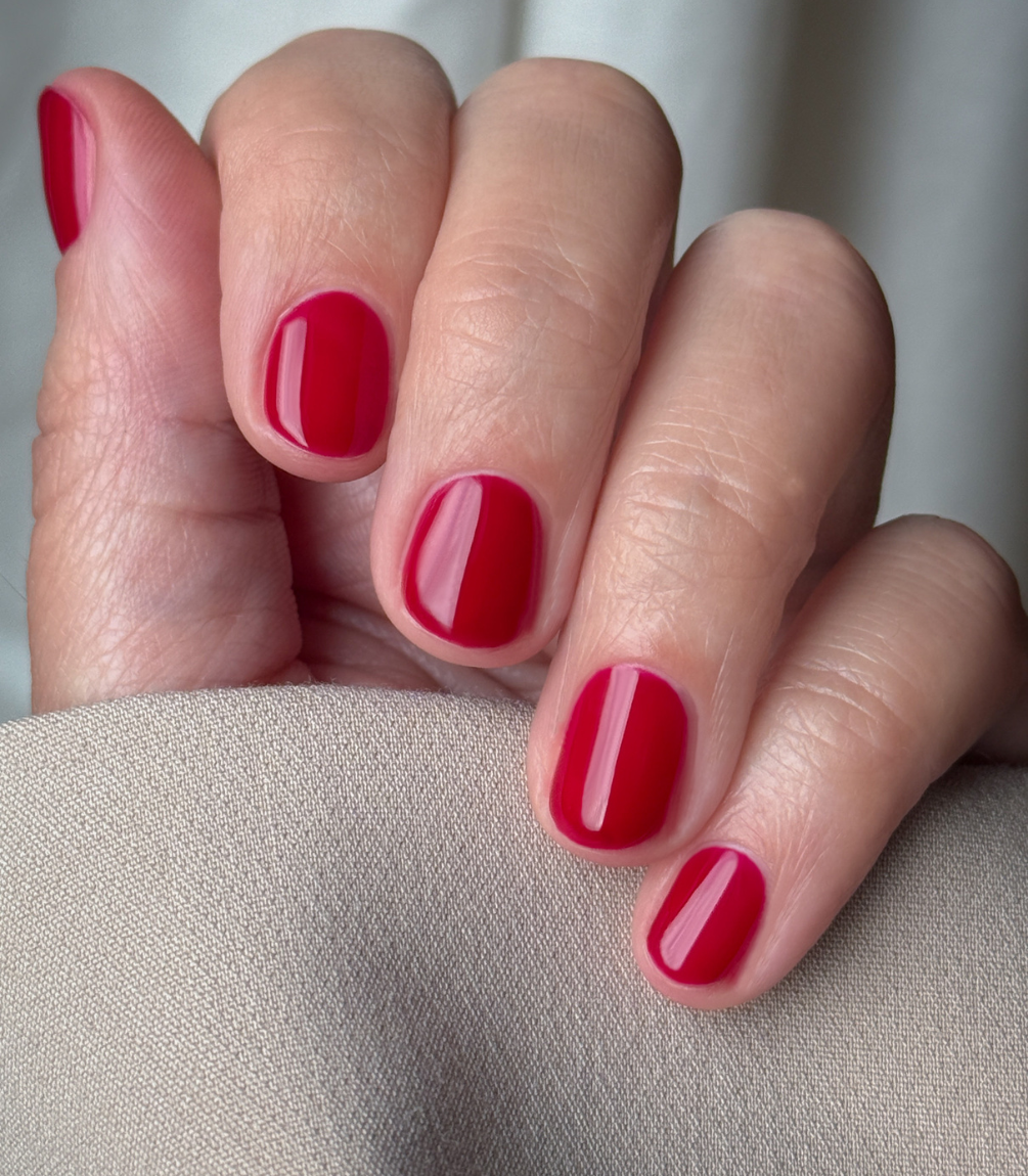 Close-up of Pink Gellac Jelly Coat Ruby Gloss gel polish texture.