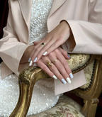 Hand wearing Pink Gellac 056 Parisian Polka Love gel nail stickers.