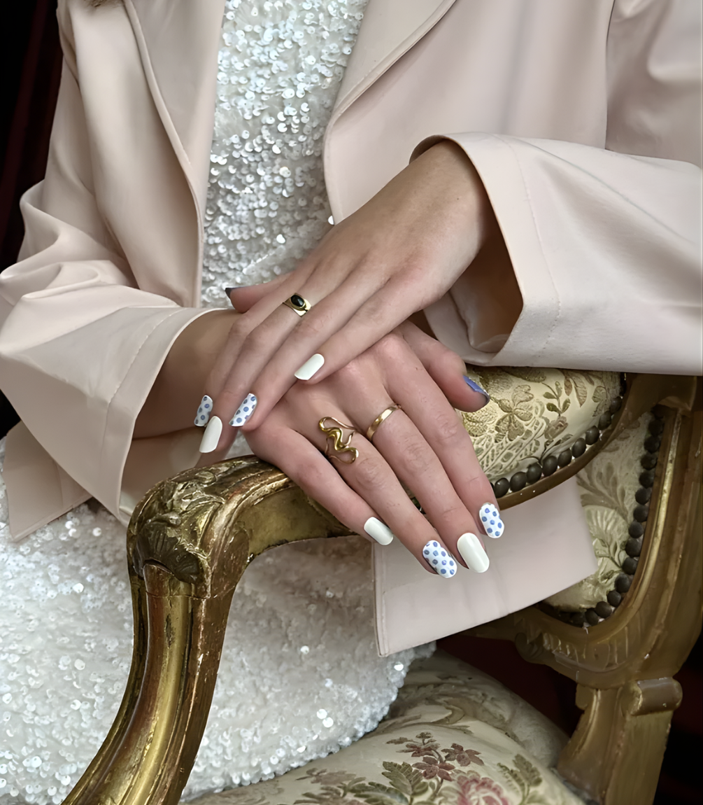 Hand wearing Pink Gellac 056 Parisian Polka Love gel nail stickers.