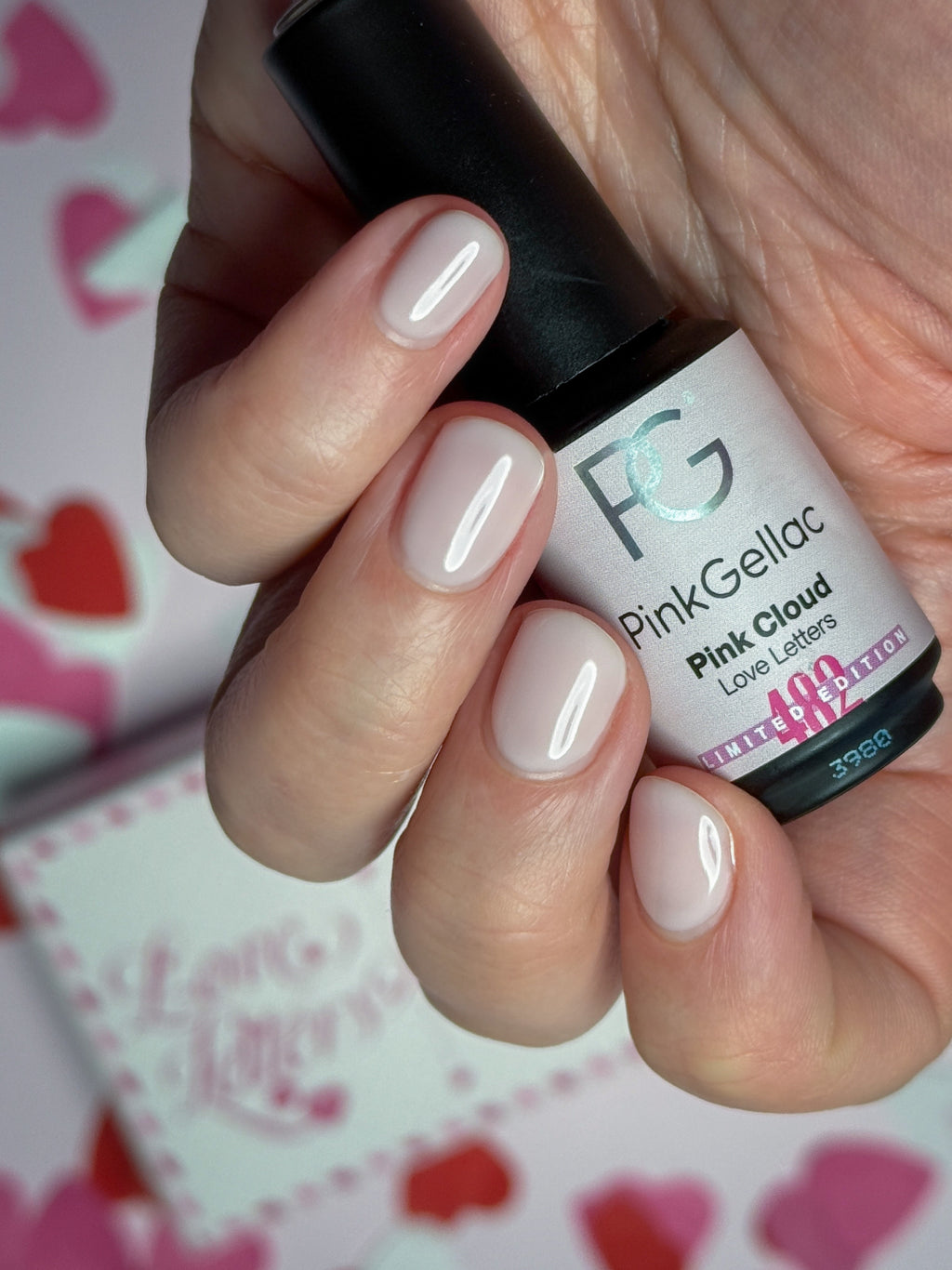 Manicured nails painted with Pink Gellac 482 Pink Cloud gel polish.