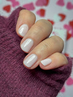 Manicured nails painted with Pink Gellac 482 Pink Cloud gel polish.