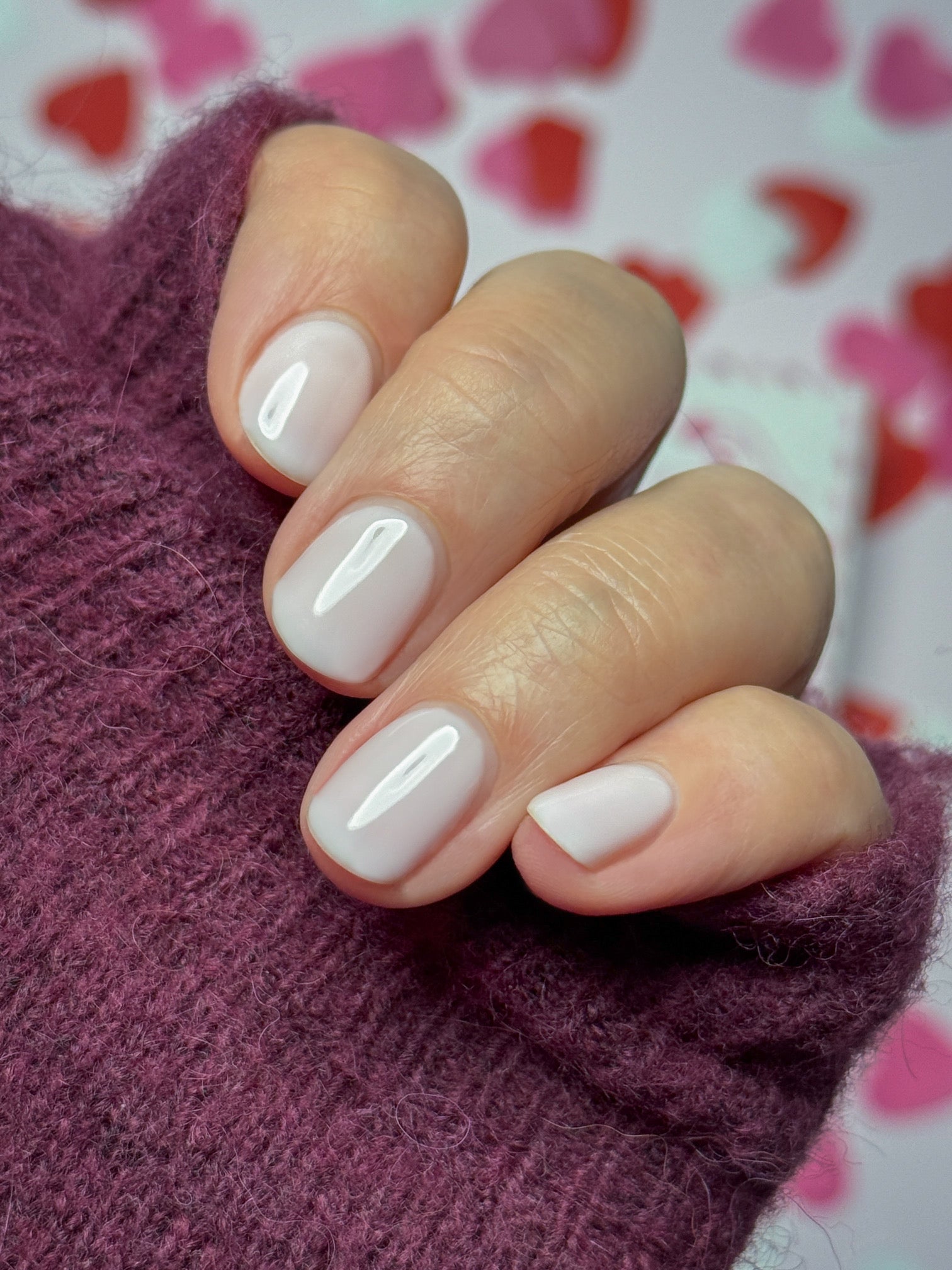 Manicured nails painted with Pink Gellac 482 Pink Cloud gel polish.