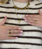 Hand wearing Pink Gellac 051 Blissful Bouquet gel nail stickers.