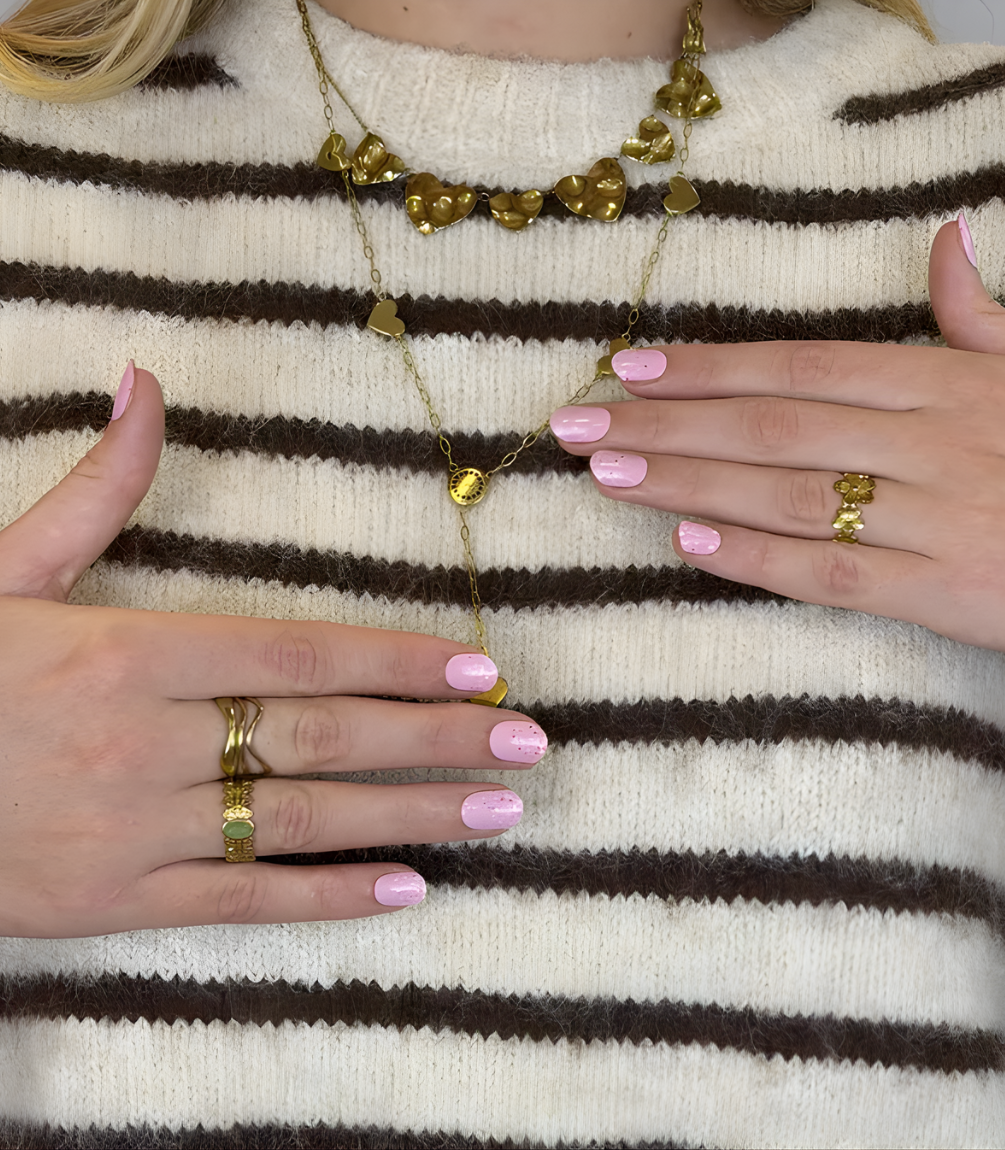 Hand wearing Pink Gellac 051 Blissful Bouquet gel nail stickers.