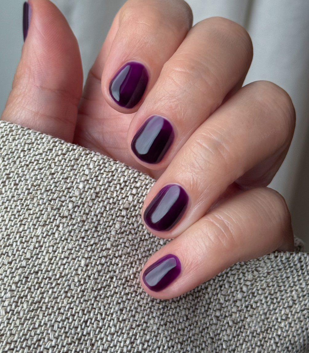 Close-up of Pink Gellac Jelly Coat Violet Sheen gel polish texture.