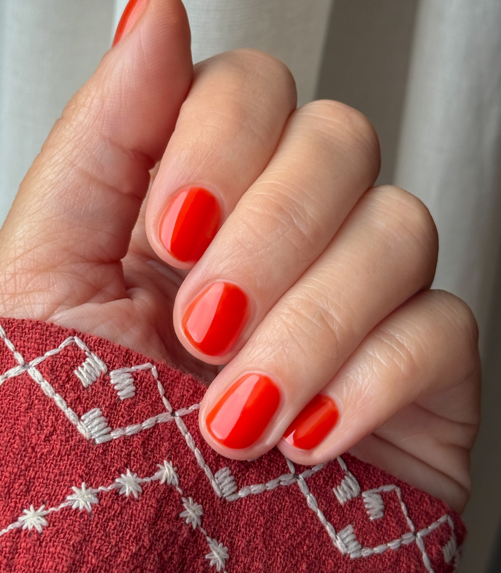 Close-up of Pink Gellac Jelly Coat Solar Glaze gel polish texture.