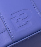 Close-up of the Pink Gellac Emily in Paris travel case fabric.