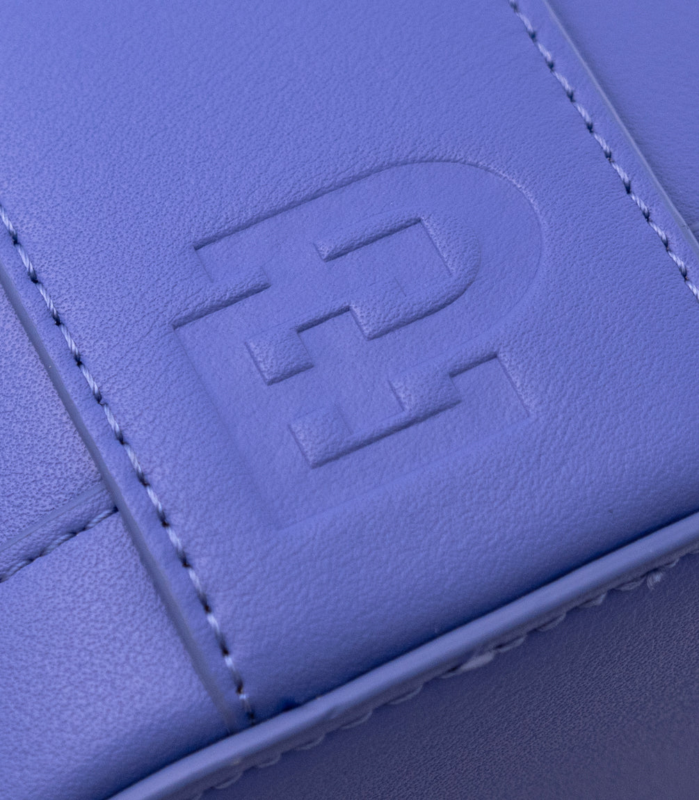 Close-up of the Pink Gellac Emily in Paris travel case fabric.