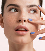 Manicured nails painted with Pink Gellac 476 Jolie Blue gel polish.