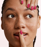 Manicured nails painted with Pink Gellac 477 Haute Magenta gel polish.