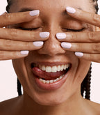 Manicured nails painted with Pink Gellac 478 Rosée Glow gel polish.