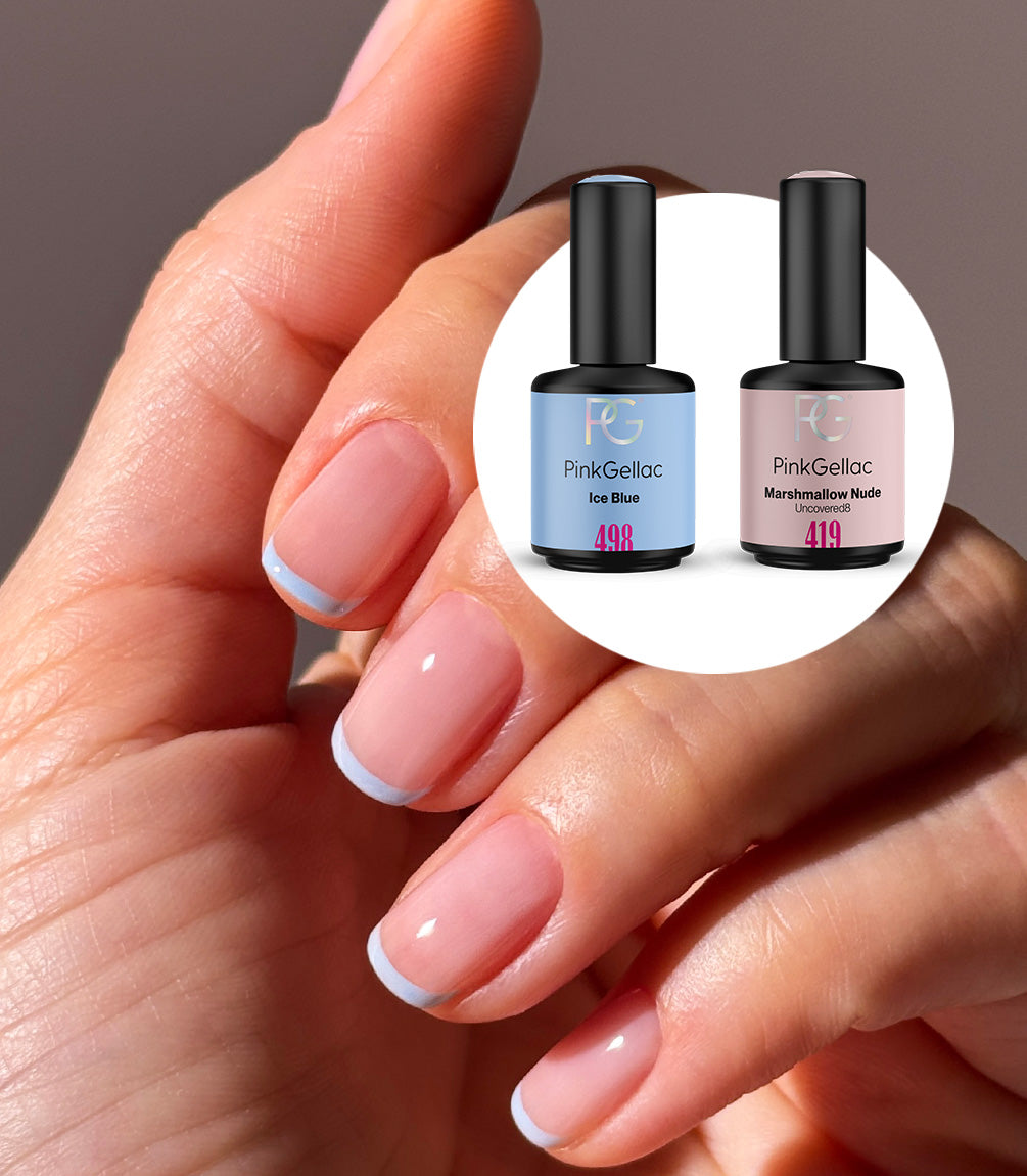 Hand with a French manicure created with the Pink Gellac Ice Blue French Manicure set.