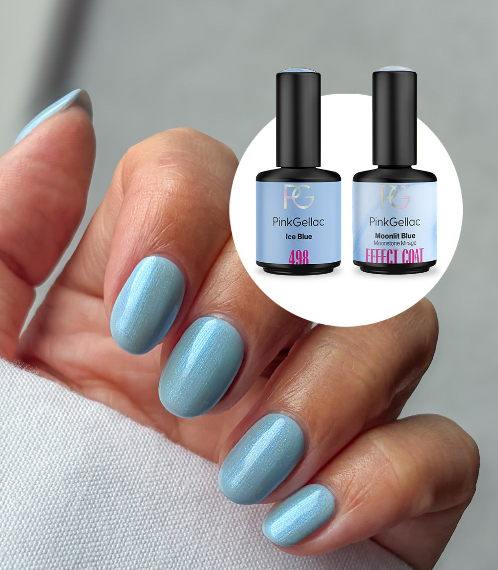 Hand with a glazed donut manicure created with the Pink Gellac Ice Blue Glazed Donut Nails set.