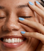 Manicured nails painted with Pink Gellac 498 Ice Blue gel polish.