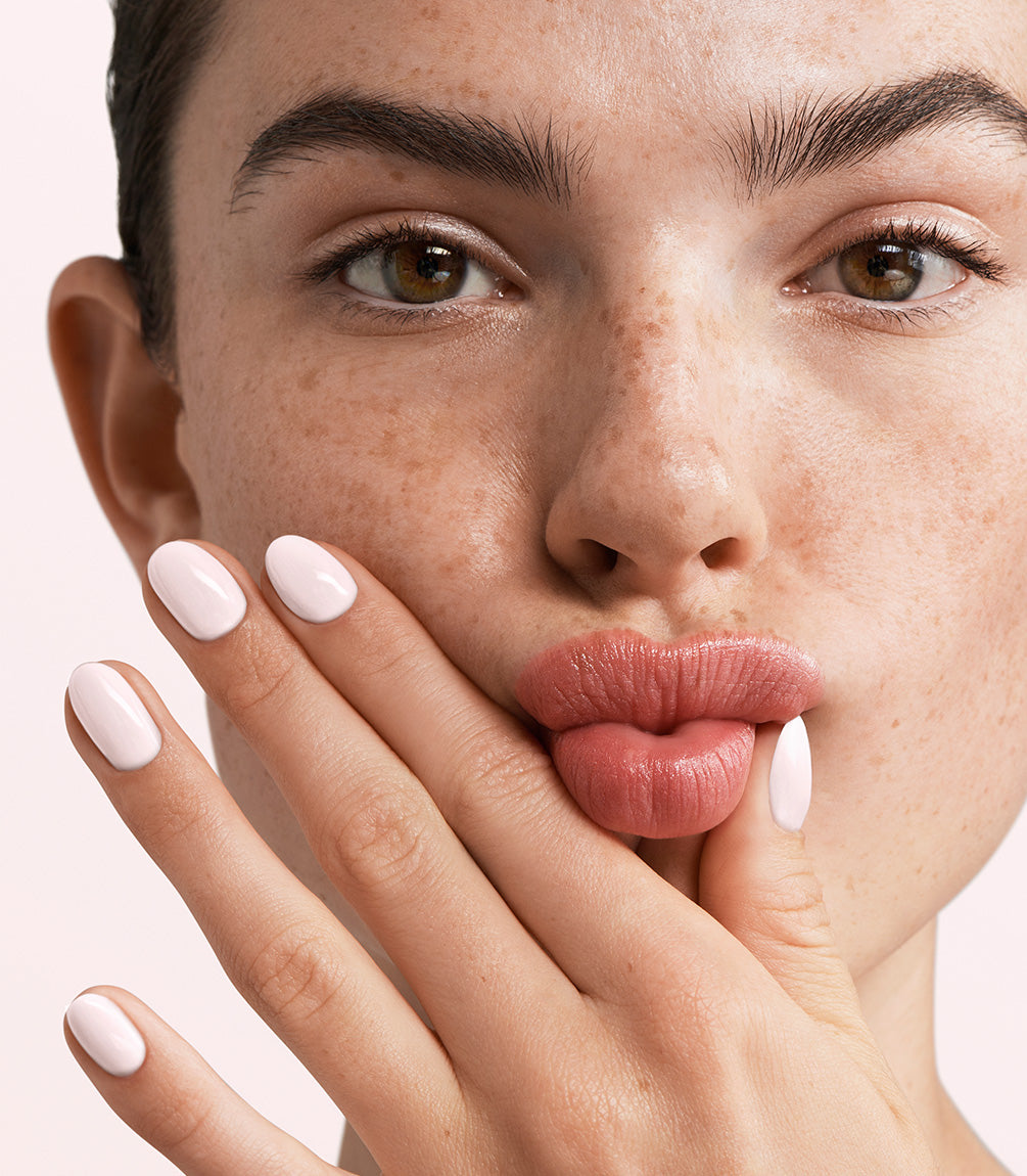 Manicured nails painted with Pink Gellac 482 Pink Cloud gel polish.