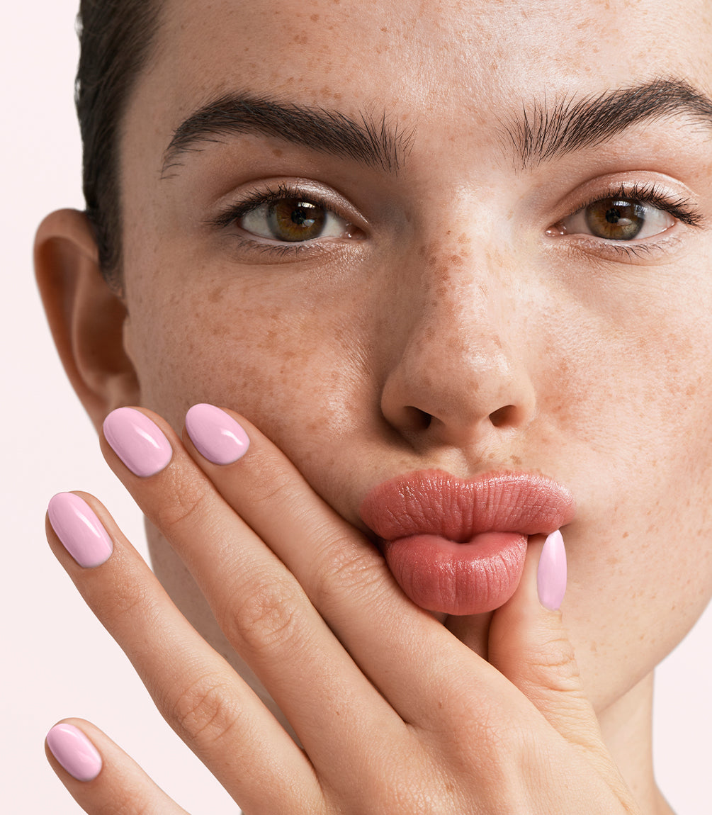 Manicured nails painted with Pink Gellac 486 Sugarcloud Pink gel polish.