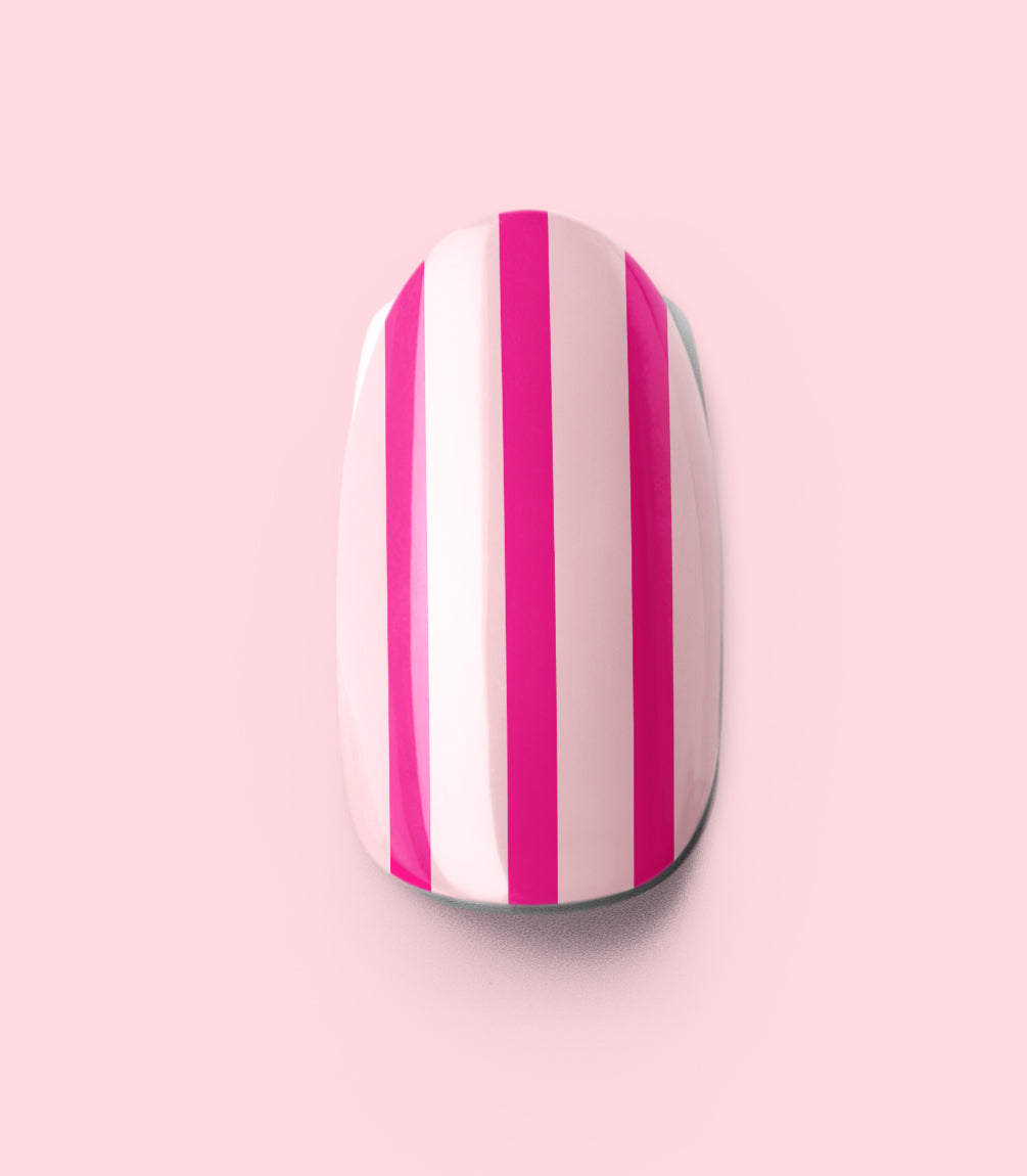 Close-up of a Pink Gellac 2009 Striped in Pink press-on nail.