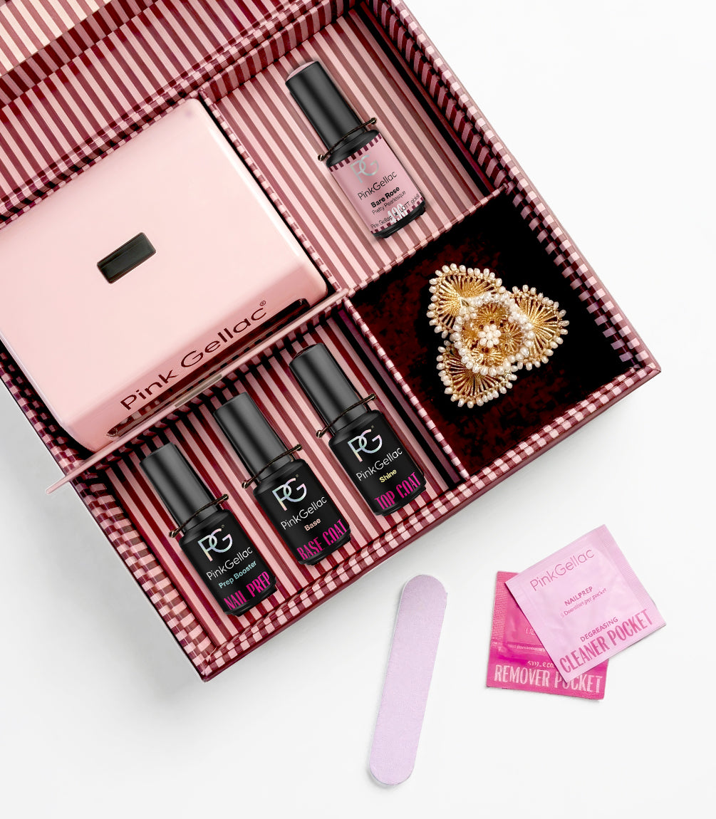 Open Pink Gellac Pretty Pearlesque gift box with gel polishes and accessories.