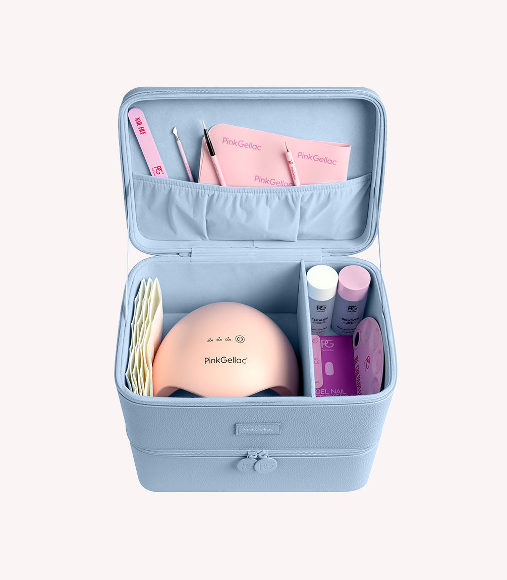 Open Pink Gellac Ice Blue storage case filled with nail care products.