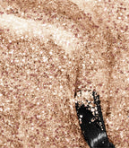 Close-up of Pink Gellac 197 Golden Glam gel polish texture.