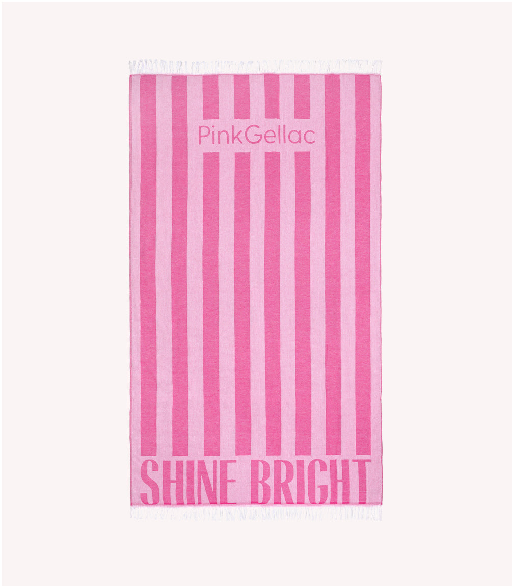 Pink and white striped towel with the text "Pink Gellac" and "Shine Bright", top and bottom.