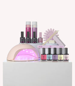 Pink Gellac Luxury Kit contents with lamp, gel polishes and accessories.