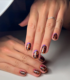 Hands with black manicured nails wearing Pink Gellac 120 Beautiful Black gel polish.